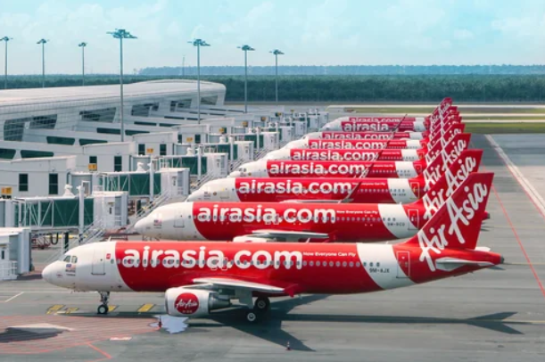 AirAsia aircraft are seen at Kuala Lumpur International Airport. AirAsia X is suspending its Kuala Lumpur-Sydney service as it reallocates capacity to higher-demand Australian routes. Photo from AirAsia.