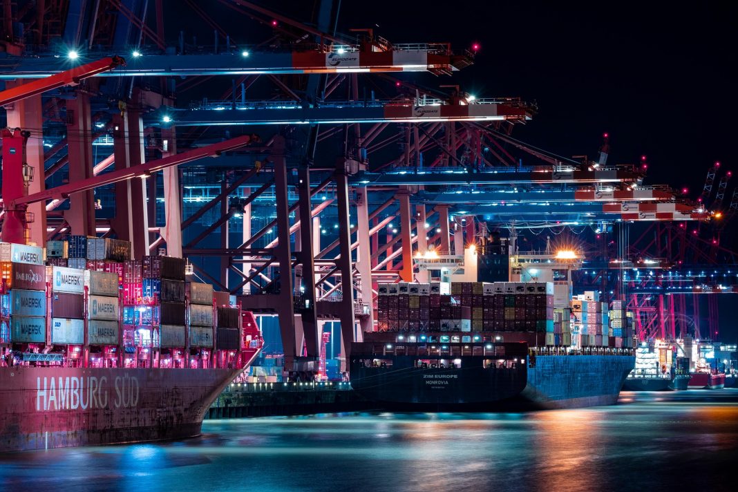 A nighttime view of a busy container terminal illustrates the scale of global maritime trade that the SMART-C GHG Project aims to decarbonize. The Philippines has launched its National Task Force to implement the IMO-Republic of Korea initiative to reduce greenhouse gas emissions from shipping. Photo courtesy of Pixabay.